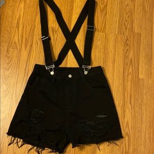 Black ripped SHEIN overall shorts